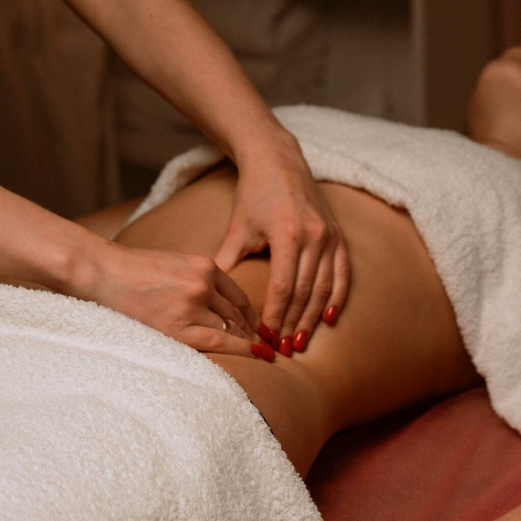 Close-up of therapist giving a soothing massage, capturing relaxation.