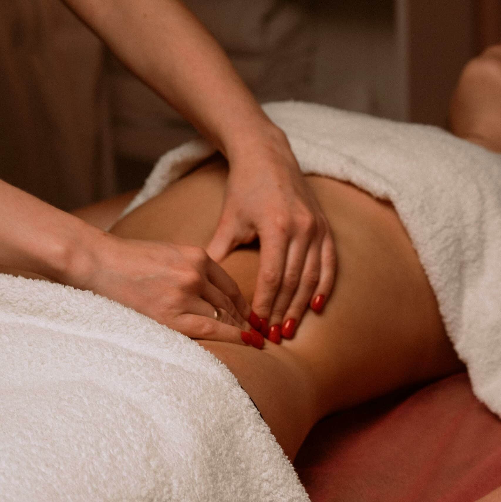 Close-up of therapist giving a soothing massage, capturing relaxation.